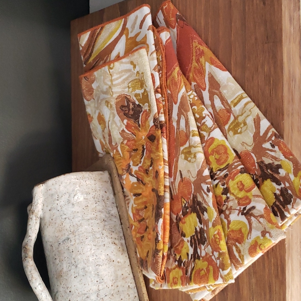 4 Vintage Mid-century Floral Napkins on a burnt orange, brown and mustard yellow